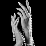 hands with pearls