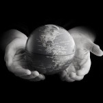 hands with globe
