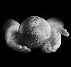 hands with globe