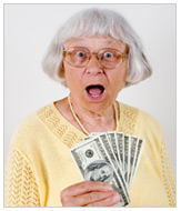 older woman holding cash